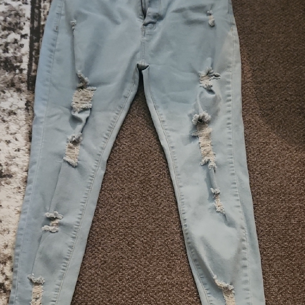 Distressed Light Blue Jeans